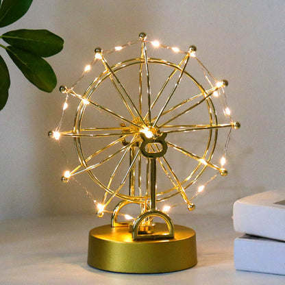 Διαβολική μύλος με perpetuum mobile και φώτα